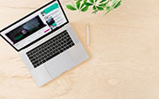 Online education or training concept top view. Laptop on the table with a live stream of teacher or coach. Copy space